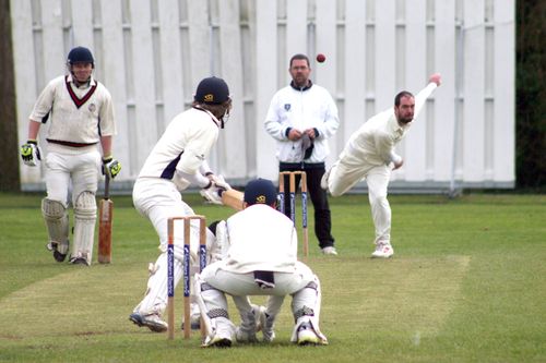 Batsman starting to charge at Resty (shortly before being stumped)